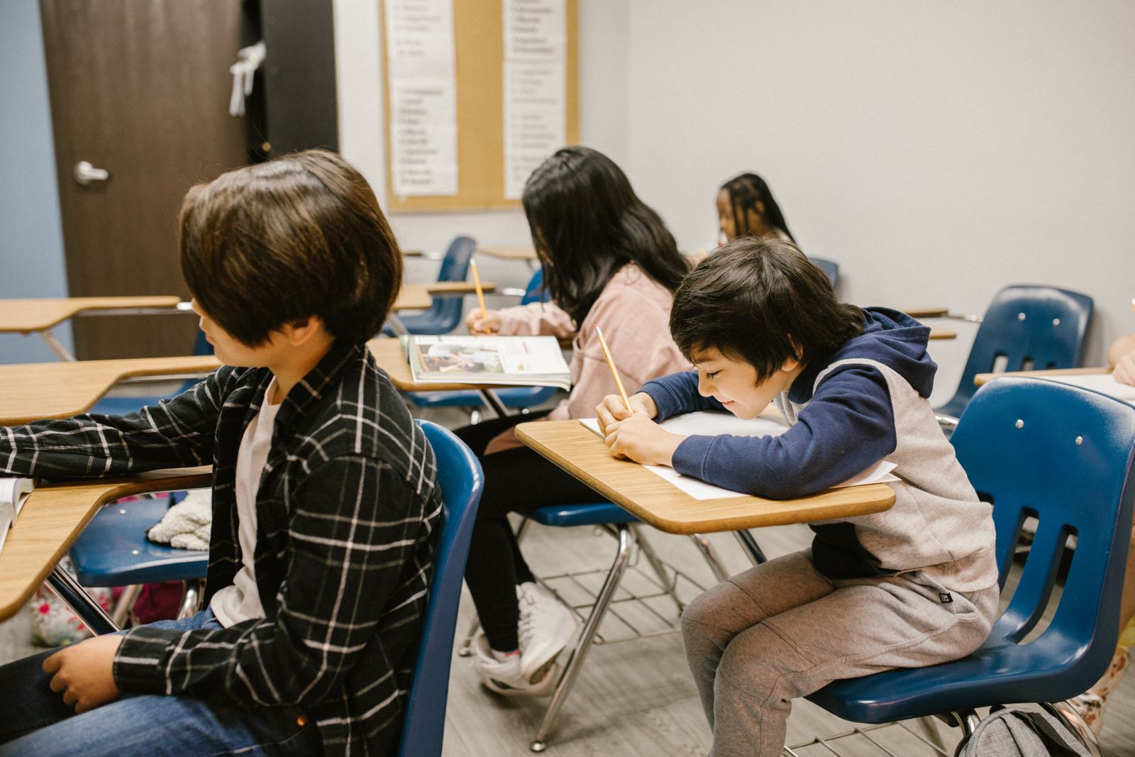 Students studying together inside a classroom