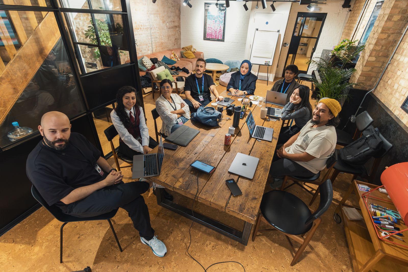 A diverse development team collaborating in a modern workspace