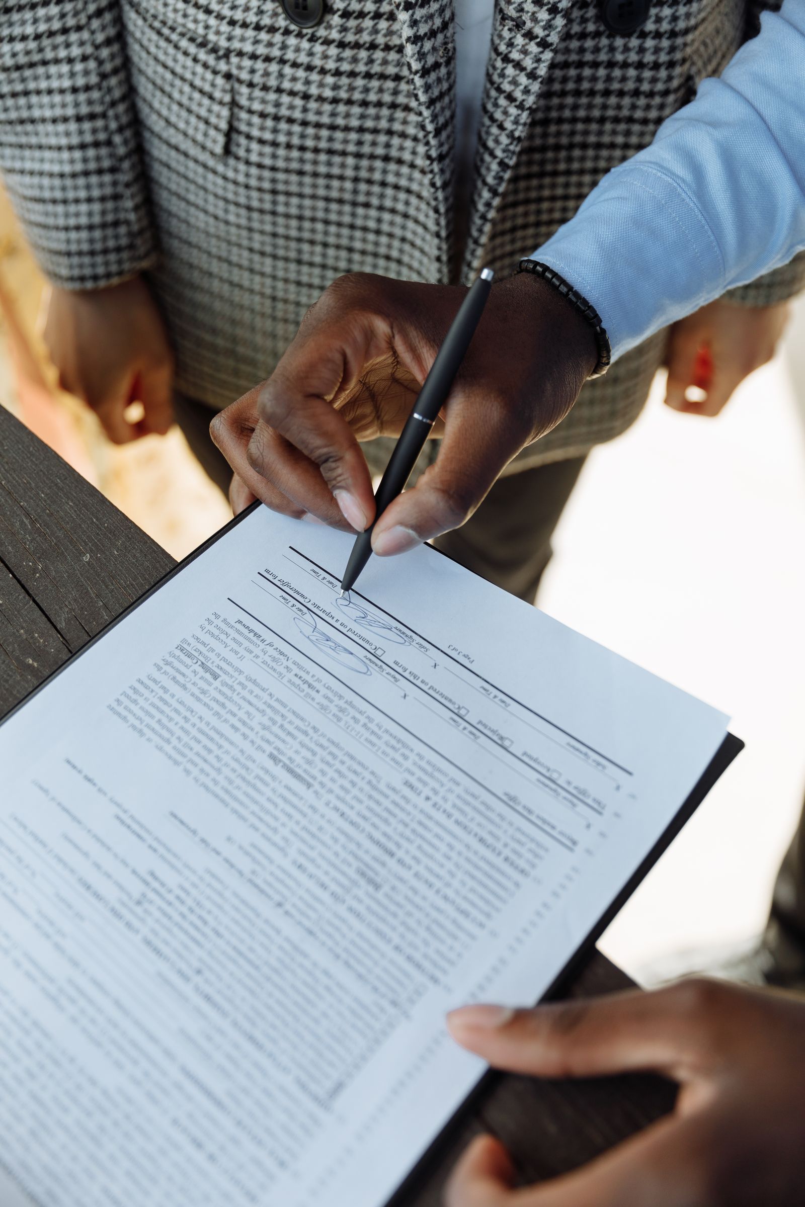 A person signing a business contract