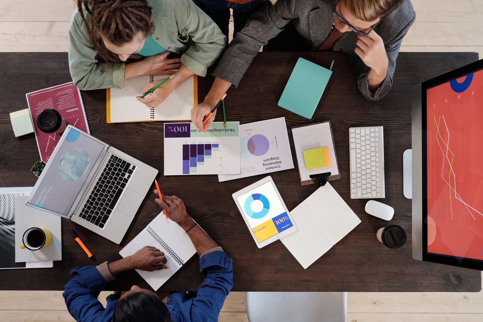 Team having a meeting around a table in an office