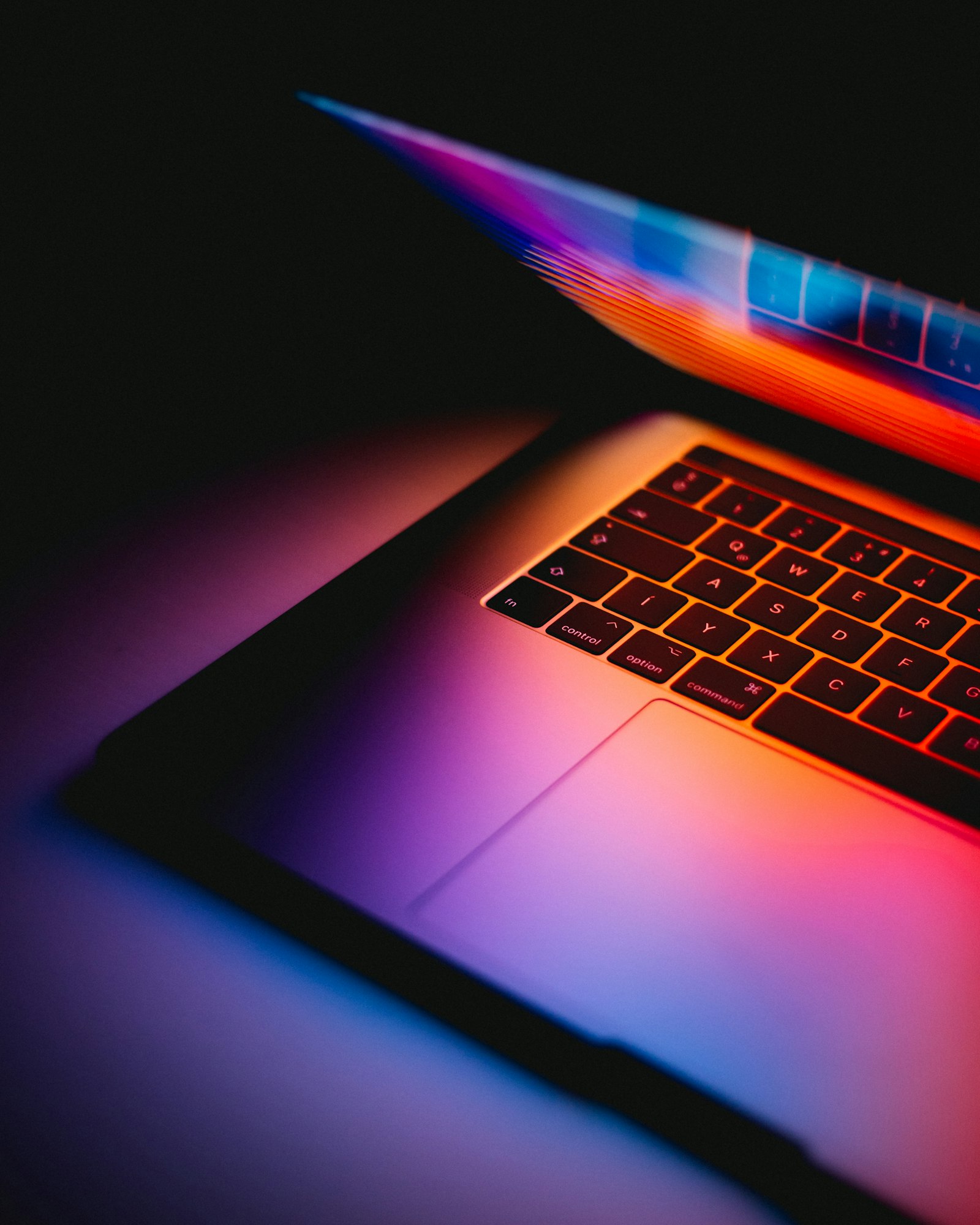Reviewing a landing page mockup on a laptop screen
