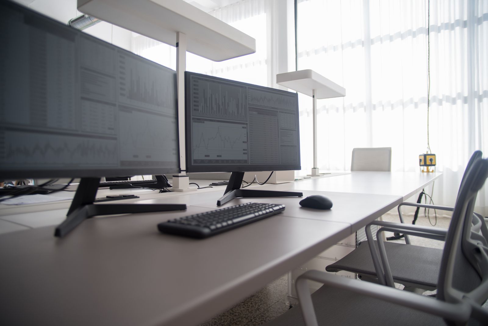 Workspace with multiple monitors and devices set up together