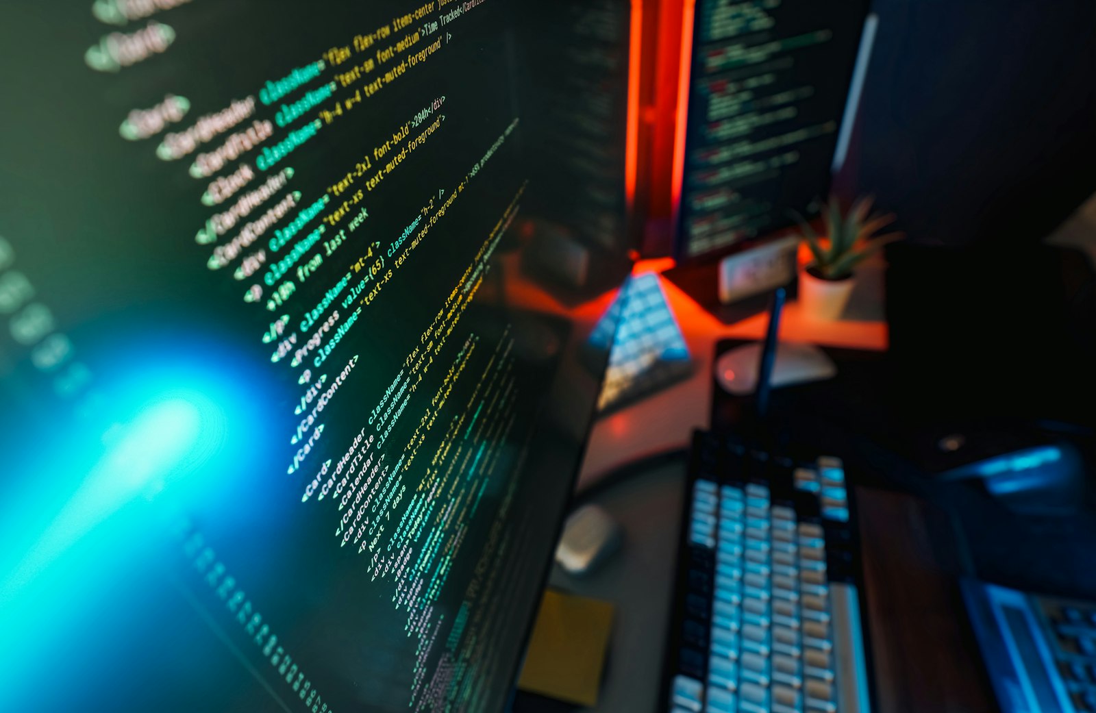 Code displayed across multiple computer screens during a review