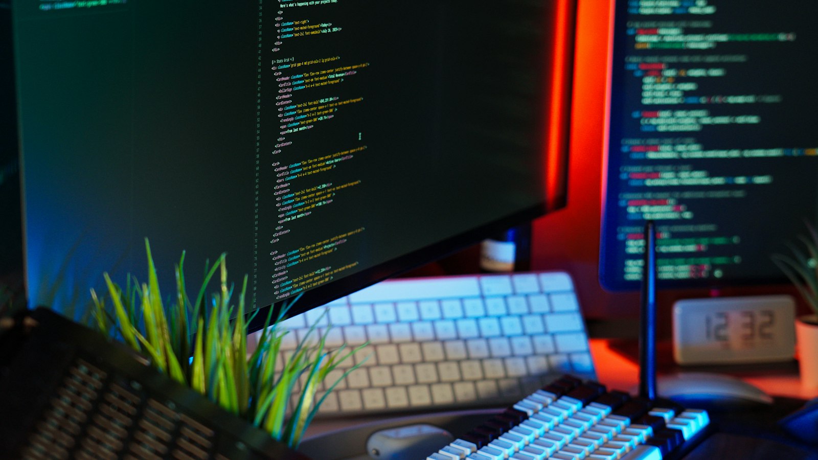 Screens displaying coding text, representing programming and error review work
